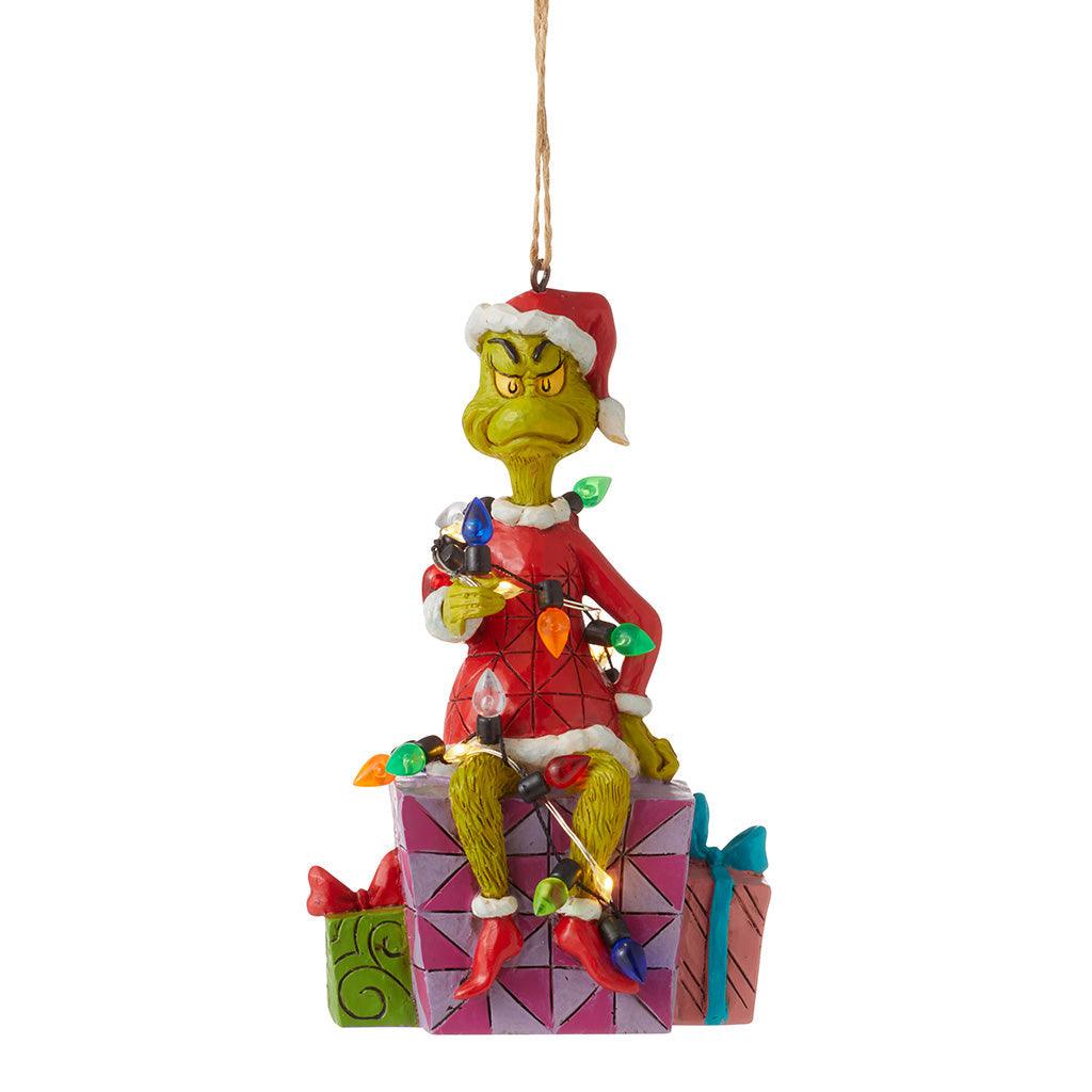 Ornement Grinch sur une pile de cadeaux - Enesco